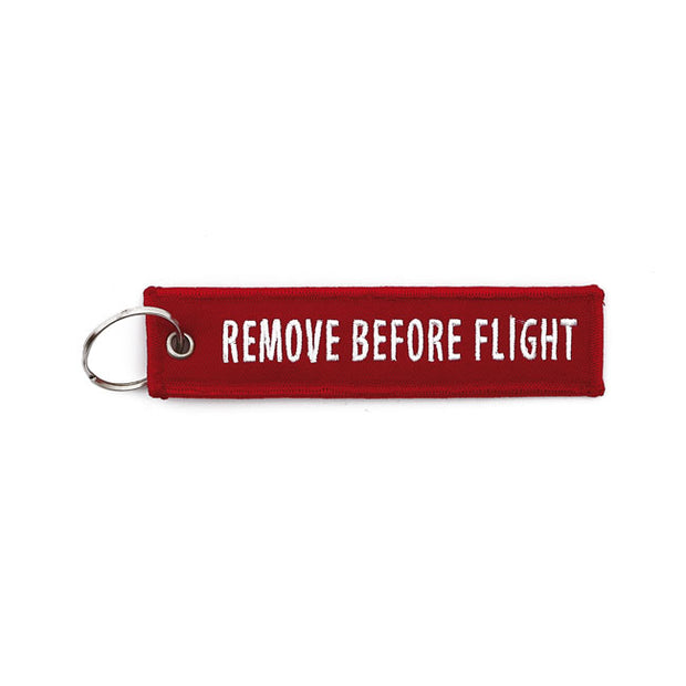 KEY RING REMOVE BEFORE FLIGHT RED